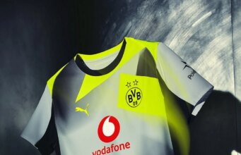 Il debutto del Borussia Dortmund colpisce nella divisa da trasferta neon 2025/26