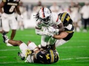 La numero 19 della Virginia soffoca il Missouri per catturare Gator Bowl