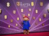 Tappeto rosso dei Bafta in foto: abiti meravigliosi, abiti eleganti e montgomery