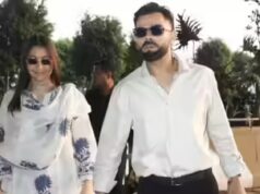 Virat-Anushka TWIN in bianco mentre escono dalla città