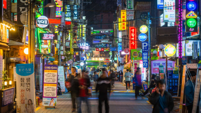 108095373-1738292856985-gettyimages-1507077883-seoulneonnightscrowdedshoppingstreetsdowntowncityscap.jpeg