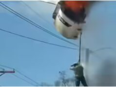 Guarda: Operaio della Louisiana penzola da una raccoglitrice di ciliegie infuocata prima di precipitare a terra