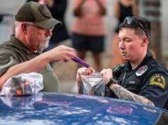 Sospetto arrestato fuori dal quartier generale di Paxton con munizioni in macchina a seguito di disordini